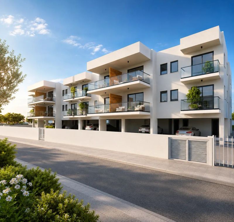 Sea-view living room with sectional sofa and floor-to-ceiling windows at Elysia Blu, Paphos
